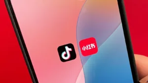 tiktok and rednote logo ina phone screen